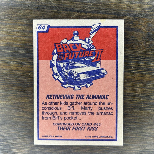 1989 Back To The Future Topps #64 Topps Trading Card "Retrieving The Almanac"