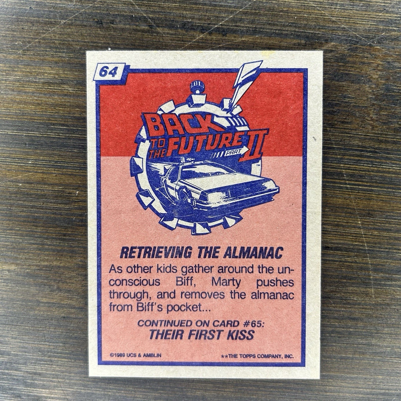 1989 Back To The Future Topps #64 Topps Trading Card "Retrieving The Almanac"1